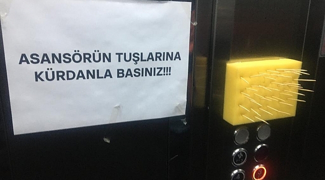 "ASANSÖRÜN TUŞLARINA KÜRDANLA BASINIZ"