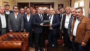 LAPSEKİLİ MUHTARLAR TURAN'I ZİYARET ETTİ